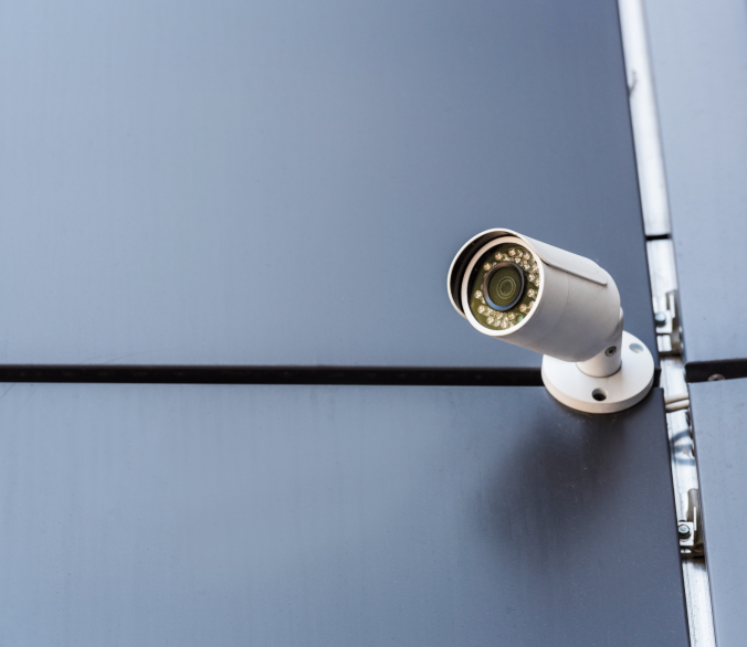 security-camera-on-wall-of-office-building-securi-2021-08-29-11-16-43-utc 1 security-camera-on-wall-of-office-building-securi-2021-08-29-11-16-43-utc 1