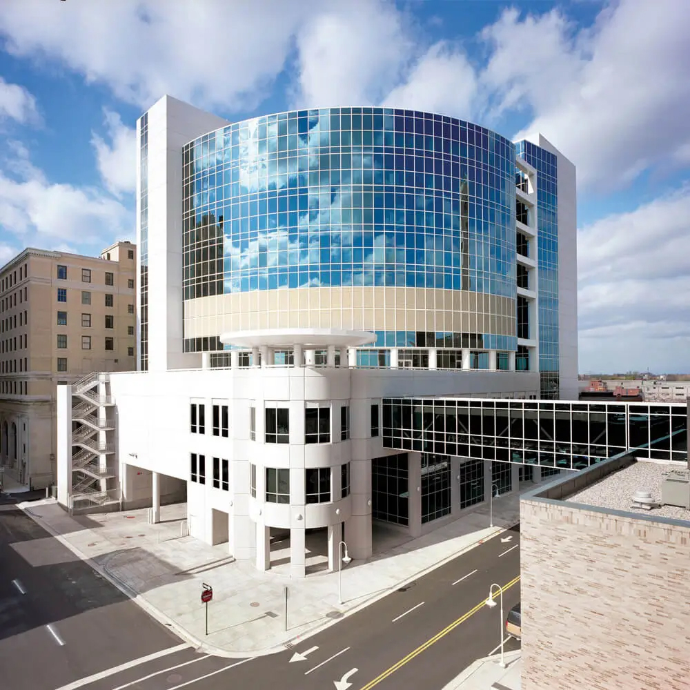 Exterior of a large Michigan hospital building served by Advanced Satellite Communications